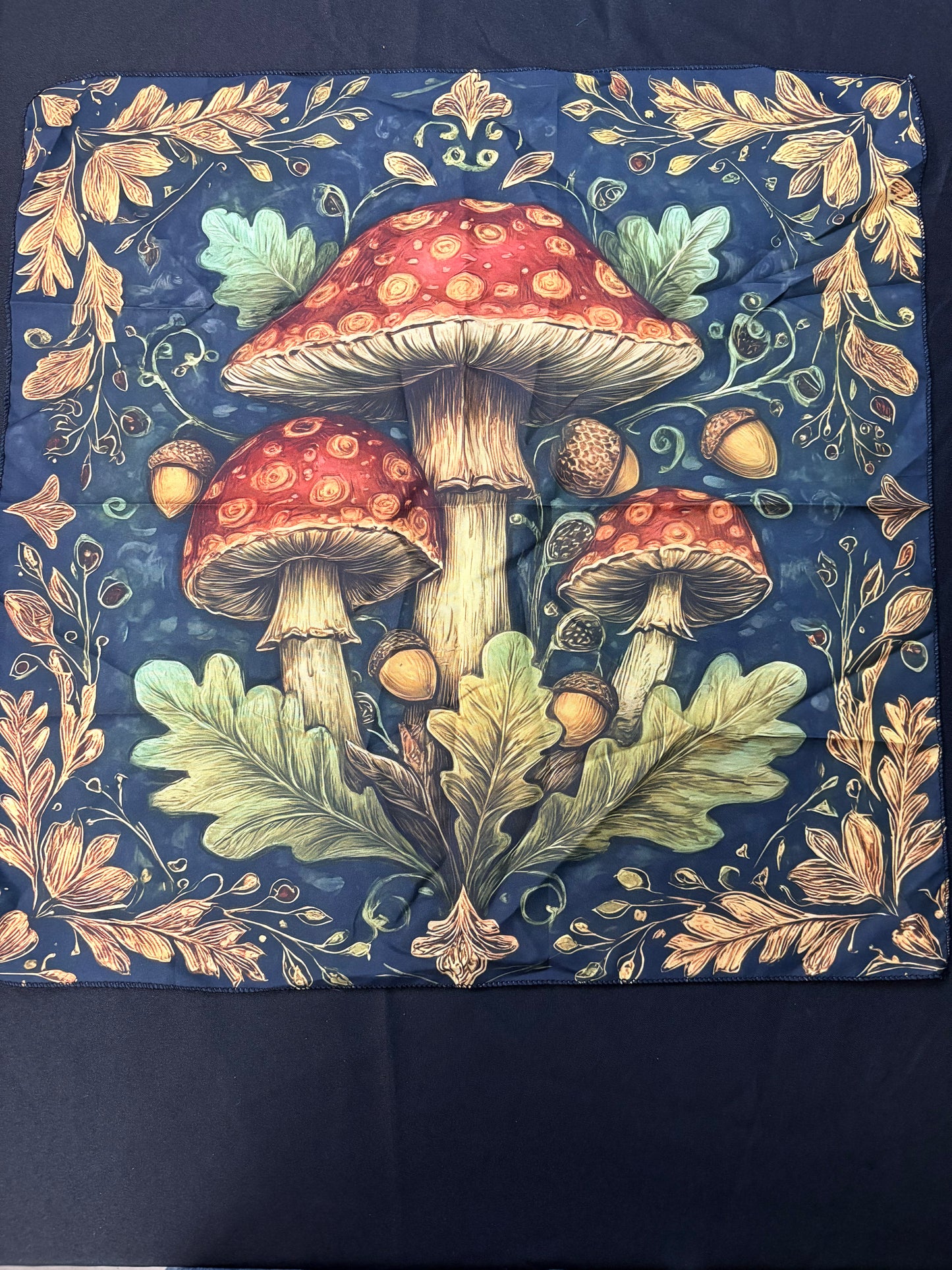 Decorative fabric with mushrooms and leaves on a blue background