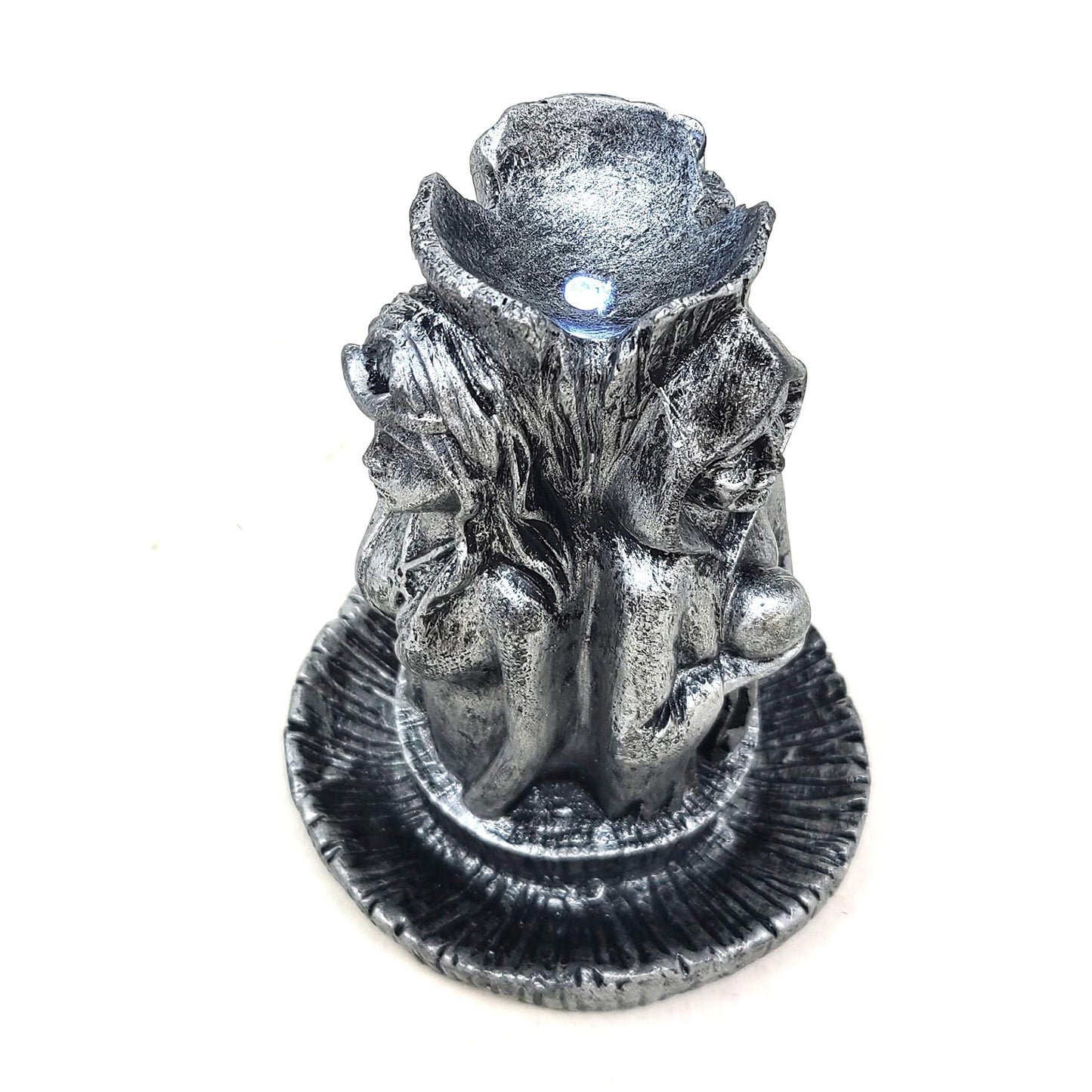 Decorative object with a tree-like design on a white background