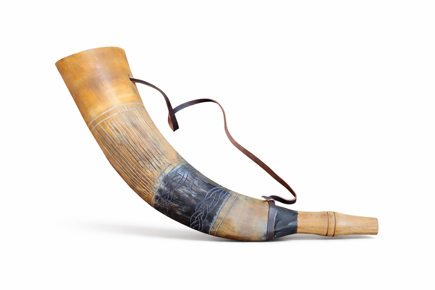 Decorative horn with a strap on a white background