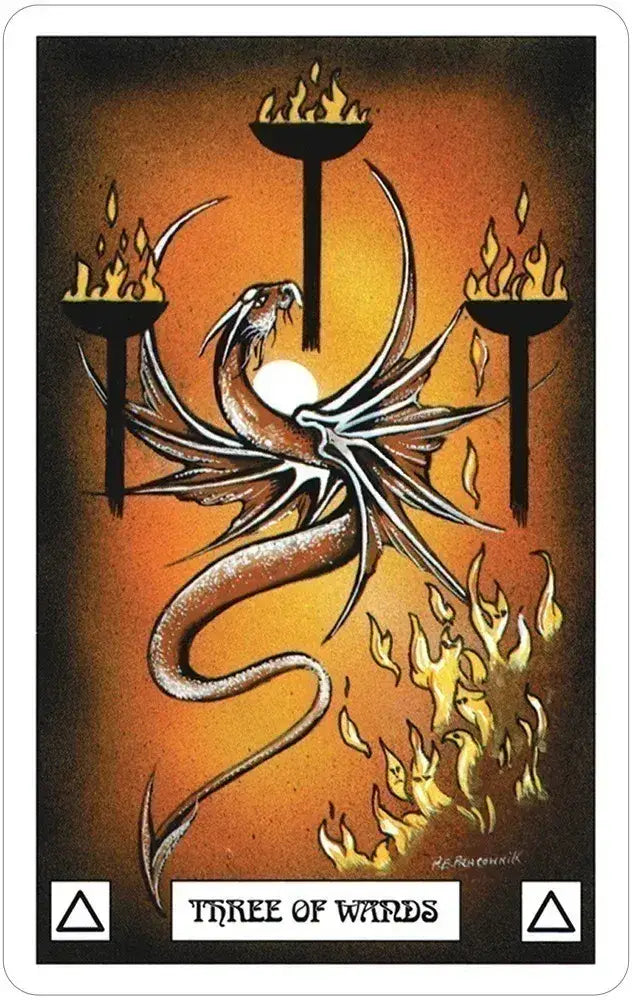 Card featuring a dragon and candles with 'Three of Wands' text on an orange background