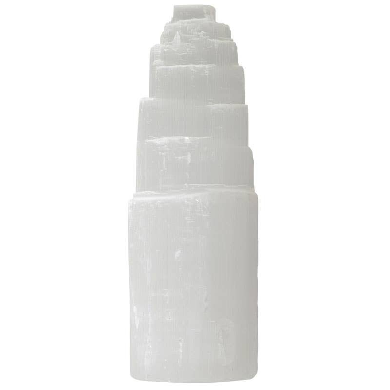 Stack of white cylindrical stones on a white background