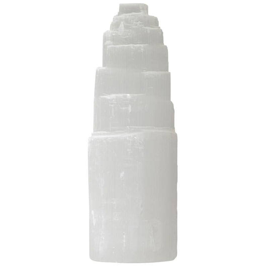 Stack of white cylindrical stones on a white background