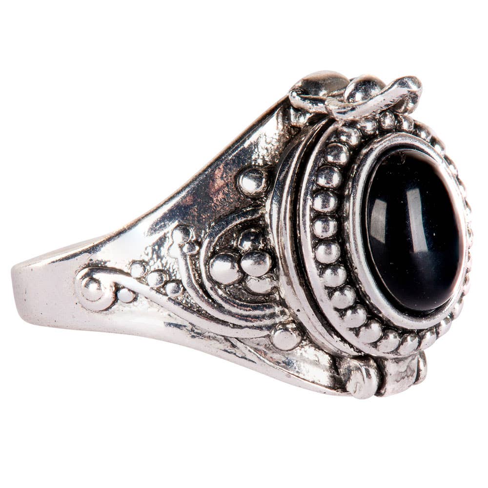 Silver ring with a black gemstone on a white background