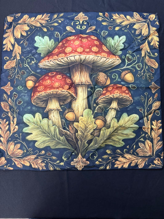 Decorative fabric with mushrooms and leaves on a blue background