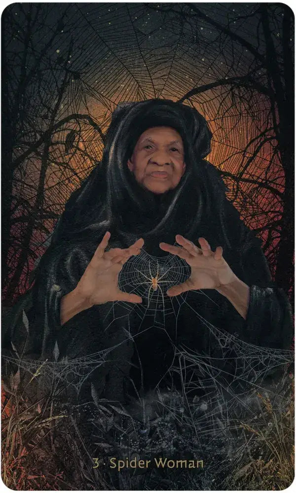 Card featuring a figure labeled 'Spider Woman' with spider webs and a dark background