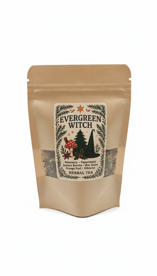 Kraft paper tea bag with 'Evergreen Witch' herbal tea label on a white background