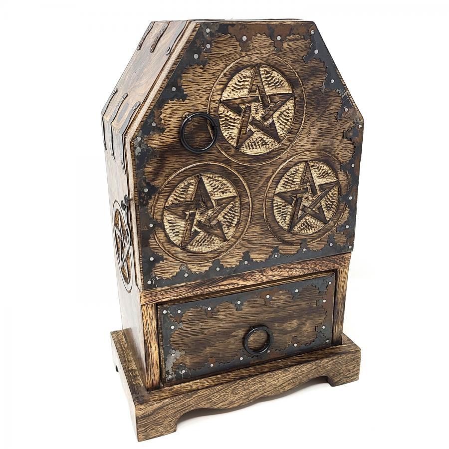 Wooden box with pentacle designs on a white background