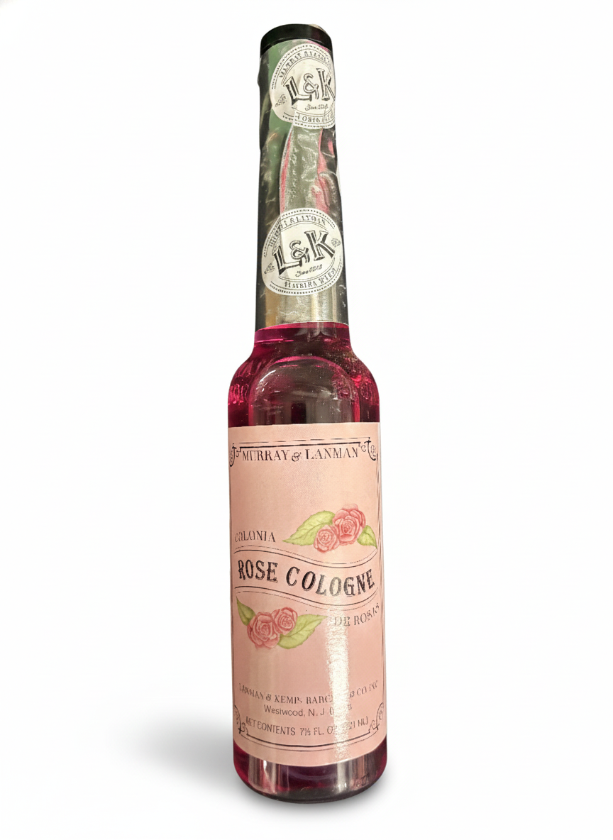 Rose cologne bottle with label on a white background